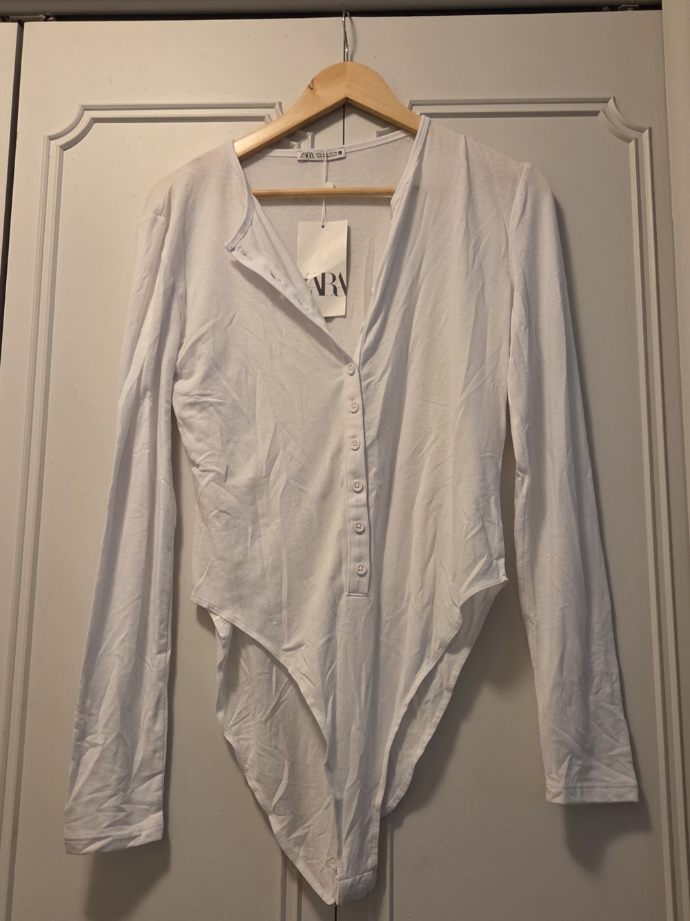 ZARA White Long-Sleeve Button-Front Bodysuit .